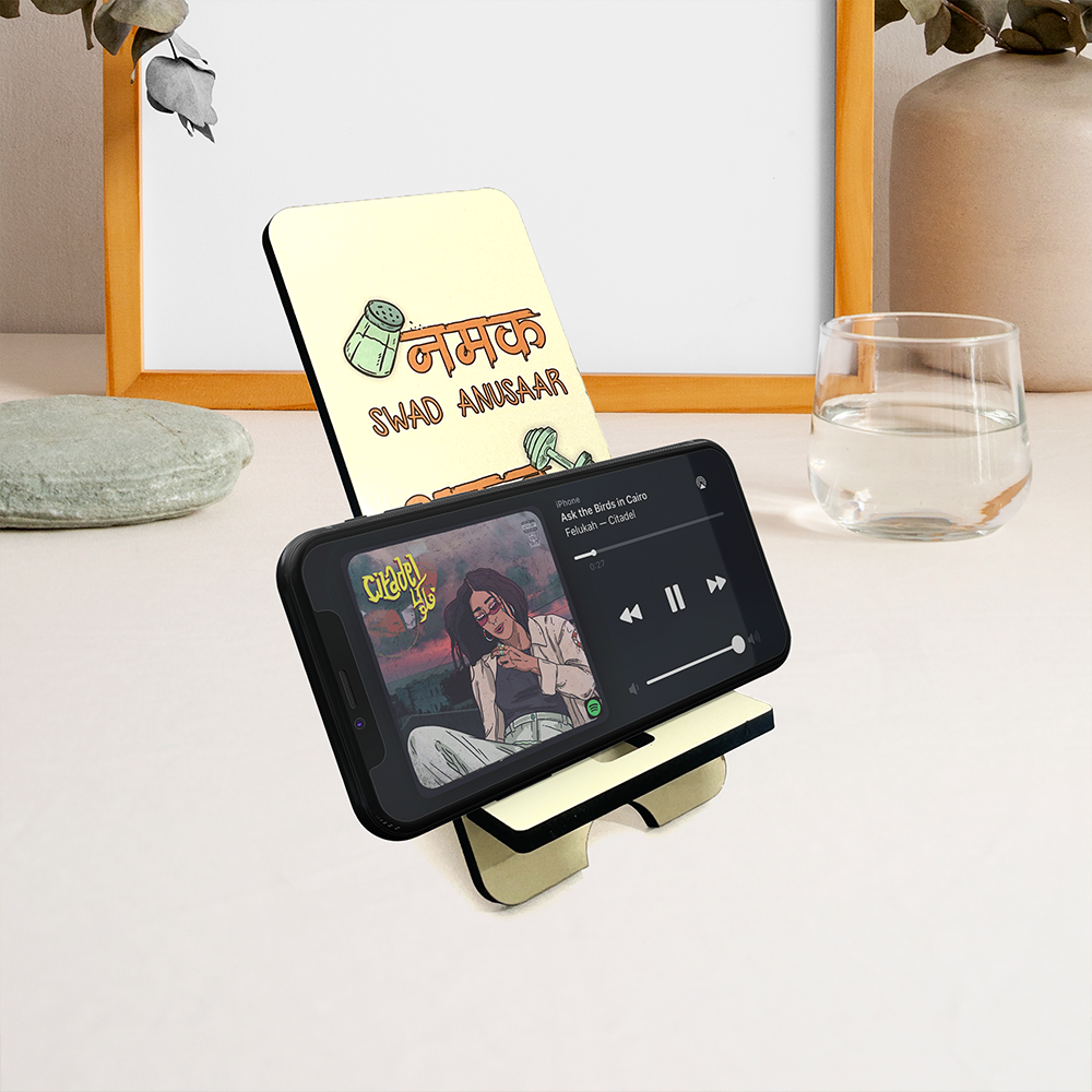 "Namak Swad Anusaar Aukaat Anusaar Printed Wooden Phone Stand – Universal Compatibility, Eco-Friendly Holder"