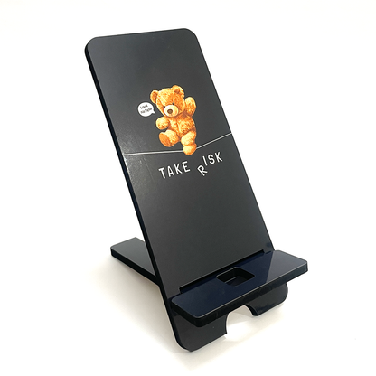 "Take Risk Inspirational Teddy Bear Wooden Phone Stand – Compact & Universal Smartphone Holder"